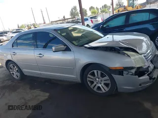 2008 Ford Fusion SEL with VIN 3FAHP08108R247080, listed as a IAAI auction lot 42015038 with 202,843 mi miles. Bid and sale history available at carsss.com. Image 13.
