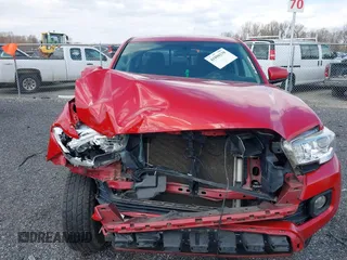 2016 Toyota Tacoma SR5 with VIN 5TFAX5GN0GX057704, listed as a IAAI auction lot 41890138 with 110,799 mi miles. Bid and sale history available at carsss.com. Image 13.