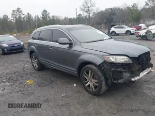 2014 Audi Q7 3.0T Premium Plus with VIN WA1LGAFE6ED012634, listed as a IAAI auction lot 41607042 with 216,667 mi miles. Bid and sale history available at carsss.com. Image 1.
