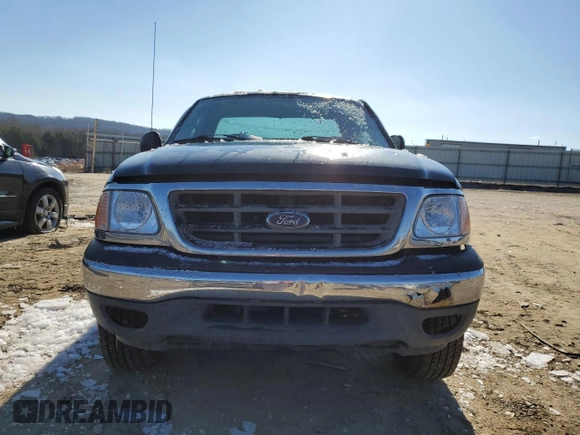 2003 Ford F-150 XL z VIN 1FTRF18243NB75182, wystawiony jako Copart lot #41501655 z przebiegiem Nie podano mil oraz Szkoda całkowita • Salvage title. Historia ofert i sprzedaży dostępna na DreamBid. Obrazek 5.