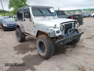 2004 Jeep Wrangler X z VIN 1J4FA39S24P701806, wystawiony jako IAAI lot #42218100 z przebiegiem 72 757 mil mil oraz . Historia ofert i sprzedaży dostępna na DreamBid. Obrazek 1.