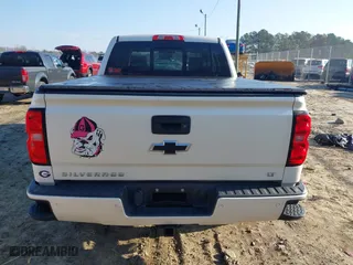 2015 Chevrolet Silverado 1500 LT with VIN 3GCUKREHXFG460818, listed as a IAAI auction lot 41491758 with 211,704 mi miles. Bid and sale history available at carsss.com. Image 16.