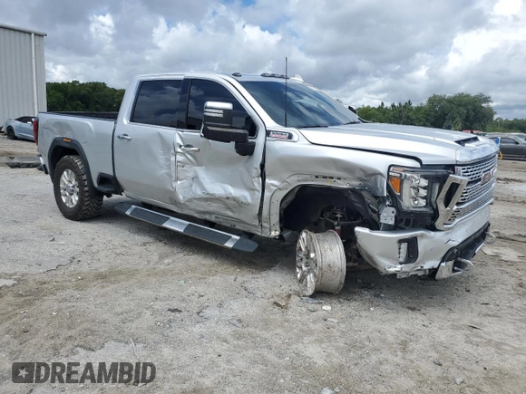 2020 GMC Sierra 2500HD Denali z VIN 1GT49REY7LF319360, wystawiony jako Copart lot #59770565 z przebiegiem 69 509 mil mil oraz Nie do naprawy • Non repairable. Historia ofert i sprzedaży dostępna na DreamBid. Obrazek 4.