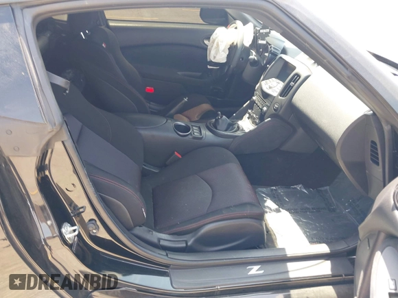 2015 Nissan 370Z Sport with VIN JN1AZ4EH3FM441836, listed as a IAAI auction lot 42094959 with 59,004 mi miles and . Bid and sale history available at DreamBid. Image 5.