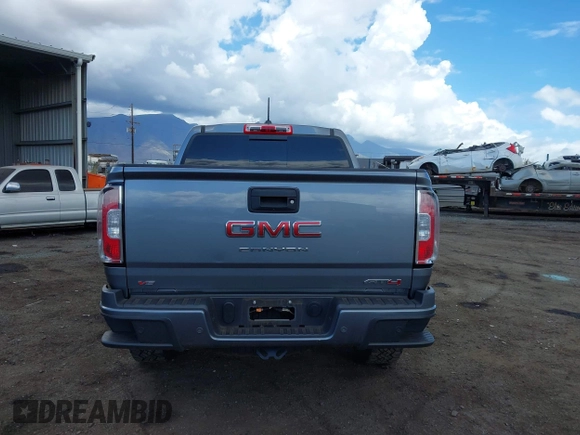 2021 GMC Canyon 4WD AT4 z VIN 1GTG6FEN8M1275345, wystawiony jako IAAI lot #42045878 z przebiegiem 68 299 mil mil oraz . Historia ofert i sprzedaży dostępna na DreamBid. Obrazek 16.