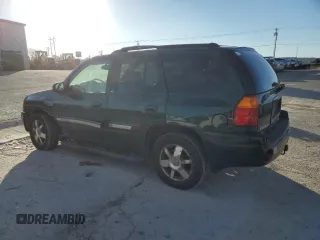 2004 GMC Envoy SLE with VIN 1GKDT13S142197514, listed as a Copart auction lot 89014465 with 202,790 mi miles and Salvage Title. Bid and sale history available at carsss.com. Image 2.