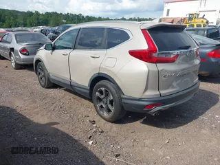 2018 Honda CR-V Touring with VIN 5J6RW2H96JL000910, listed as a IAAI auction lot 42490580 with 201,534 mi miles and . Bid and sale history available at DreamBid. Image 3.