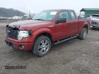 2014 Ford F-150 XL with VIN 1FTFX1EF0EKE42992, listed as a IAAI auction lot 41568048 with 156,499 mi miles. Bid and sale history available at carsss.com. Image 2.