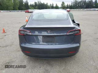 2023 Tesla Model 3 z VIN 5YJ3E1EA7PF683249, wystawiony jako Copart lot #56234465 z przebiegiem 9 494 mil mil oraz Szkoda całkowita • Salvage title. Historia ofert i sprzedaży dostępna na DreamBid. Obrazek 6.