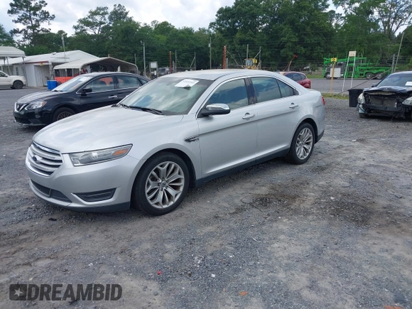 2013 Ford Taurus Limited with VIN 1FAHP2F87DG235392, listed as a IAAI auction lot 42431543 with 123,904 mi miles and . Bid and sale history available at DreamBid. Image 2.