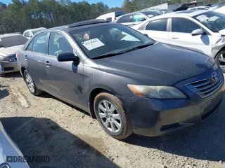 2009 Toyota Camry Hybrid with VIN JTNBB46K893051871, listed as a IAAI auction lot 41672891 with 248,425 mi miles. Bid and sale history available at carsss.com. Image 1.