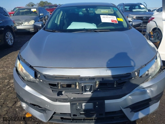 2016 Honda Civic Sedan LX with VIN 19XFC2F53GE051154, listed as a IAAI auction lot 41921524 with 101,979 mi miles. Bid and sale history available at carsss.com. Image 6.