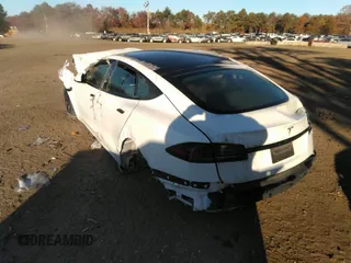 2022 Tesla Model S with VIN 5YJSA1E54NF488023, listed as a IAAI auction lot 36074023 with 200 mi miles and . Bid and sale history available at DreamBid. Image 3.