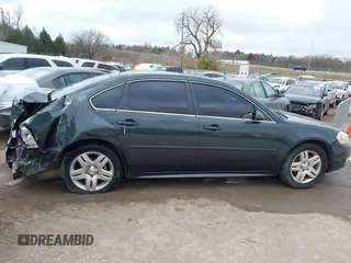 2014 Chevrolet Impala LT with VIN 2G1WB5E35E1123415, listed as a IAAI auction lot 41101111 with 129,870 mi miles and . Bid and sale history available at DreamBid. Image 13.