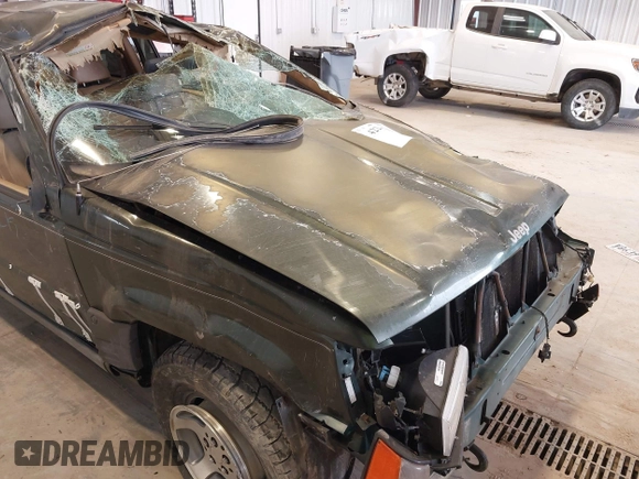 1997 Jeep Grand Cherokee Laredo z VIN 1J4GZ58YXVC729117, wystawiony jako IAAI lot #42244799 z przebiegiem Nie podano mil oraz . Historia ofert i sprzedaży dostępna na DreamBid. Obrazek 20.