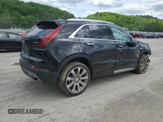 2020 Cadillac XT4 FWD Premium Luxury with VIN 1GYFZCR46LF113499, listed as a Copart auction lot 57534205 with 64,859 mi miles and Salvage title. Bid and sale history available at DreamBid. Image 3.