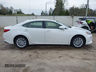 2015 Lexus ES 330 with VIN JTHBK1GGXF2209513, listed as a IAAI auction lot 41910570 with 141,084 mi miles and . Bid and sale history available at DreamBid. Image 13.