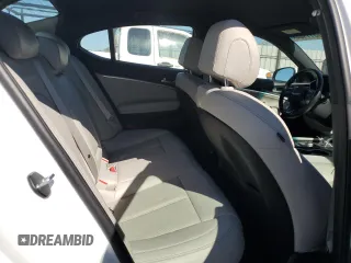 2023 Genesis G70 2.0T with VIN KMTG34TA0PU116515, listed as a Copart auction lot 70511154 with 11,942 mi miles and Salvage Title. Bid and sale history available at carsss.com. Image 10.