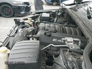 2012 Jeep Grand Cherokee SRT-8 z VIN 1C4RJFDJ8CC112350, wystawiony jako IAAI lot #42995991 z przebiegiem 210 738 mil mil oraz . Historia ofert i sprzedaży dostępna na DreamBid. Obrazek 22.