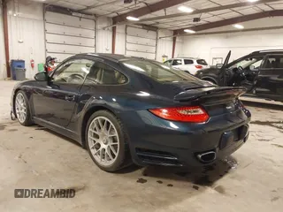 2011 Porsche 911 Turbo with VIN WP0AD2A93BS766801, listed as a IAAI auction lot 41566167 with 66,785 mi miles. Bid and sale history available at carsss.com. Image 3.