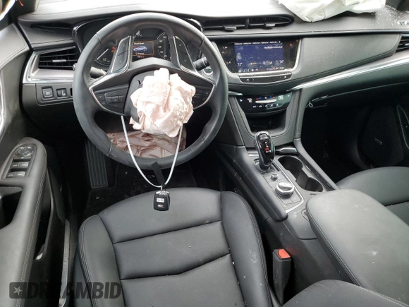 2023 Cadillac XT5 FWD Luxury z VIN 1GYKNAR40PZ106096, wystawiony jako Copart lot #80909074 z przebiegiem 19 677 mil mil oraz Nie do naprawy • Non repairable. Historia ofert i sprzedaży dostępna na DreamBid. Obrazek 8.