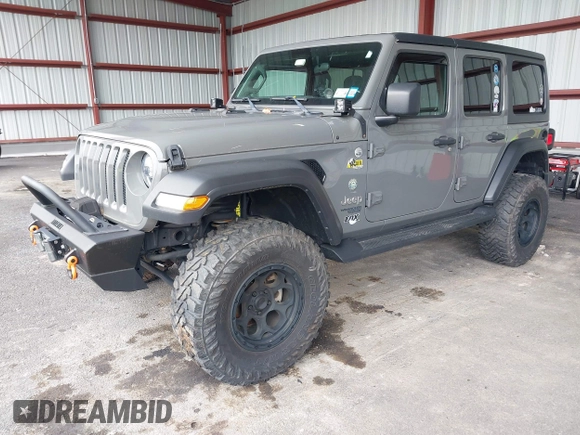 2021 Jeep Wrangler Unlimited Sport S z VIN 1C4HJXDG2MW542087, wystawiony jako IAAI lot #41893734 z przebiegiem 57 000 mil mil oraz . Historia ofert i sprzedaży dostępna na DreamBid. Obrazek 2.