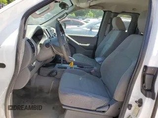 2015 Nissan Frontier S with VIN 1N6BD0CT6FN749428, listed as a Copart auction lot 58000685 with 211,574 mi miles and Clean title. Bid and sale history available at DreamBid. Image 7.