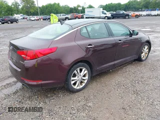 2012 Kia Optima EX z VIN 5XXGN4A71CG011465, wystawiony jako IAAI lot #42478460 z przebiegiem 197 230 mil mil oraz . Historia ofert i sprzedaży dostępna na DreamBid. Obrazek 4.
