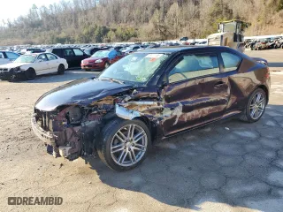 2011 Scion tC with VIN JTKJF5C79B3004406, listed as a Copart auction lot 46571185 with 0 mi miles and Salvage Title. Bid and sale history available at carsss.com. Image 1.