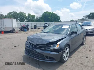 2014 Volkswagen Jetta SE with VIN 3VWD07AJ3EM232529, listed as a IAAI auction lot 42286442 with 125,000 mi miles and . Bid and sale history available at DreamBid. Image 2.