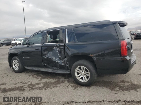 2018 Chevrolet Suburban LS with VIN 1GNSCGKC6JR303482, listed as a Copart auction lot 54703925 with 214,158 mi miles and Salvage title. Bid and sale history available at DreamBid. Image 2.