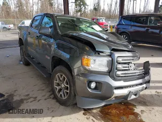 2015 GMC Canyon 2WD SLE with VIN 1GTG5BE37F1265497, listed as a IAAI auction lot 41507236 with 101,385 mi miles. Bid and sale history available at carsss.com. Image 1.
