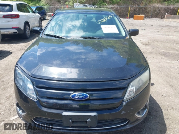 2011 Ford Fusion SE with VIN 3FAHP0HA0BR265182, listed as a IAAI auction lot 42201257 with 144,718 mi miles and . Bid and sale history available at carsss.com. Image 6.
