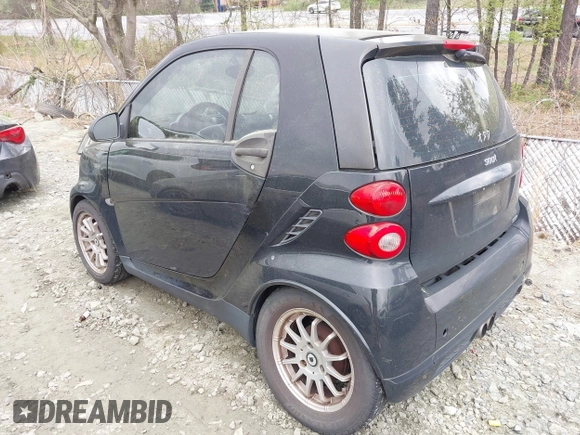 2009 Smart fortwo Pure with VIN WMEEJ31X69K244948, listed as a IAAI auction lot 41925643 with 129,877 mi miles and . Bid and sale history available at DreamBid. Image 3.