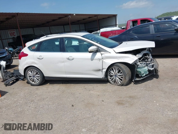 2016 Ford Focus Titanium with VIN 1FADP3N28GL222941, listed as a IAAI auction lot 42050881 with 97,001 mi miles and . Bid and sale history available at DreamBid. Image 13.