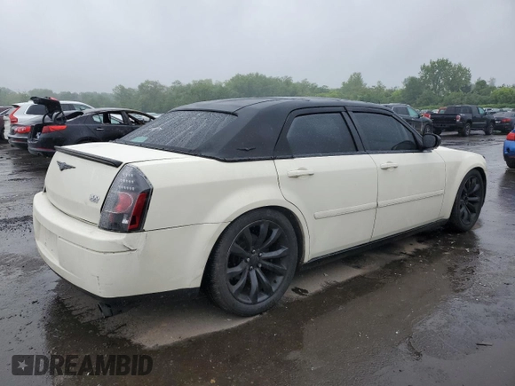 2005 Chrysler 300 300 z VIN 2C3JA43R35H175126, wystawiony jako Copart lot #58218305 z przebiegiem 167 612 mil mil oraz Szkoda całkowita • Salvage title. Historia ofert i sprzedaży dostępna na DreamBid. Obrazek 3.