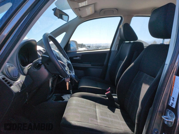 2012 Suzuki SX4 Crossover with VIN JS2YB5A31C6306926, listed as a Copart auction lot 79307604 with 131,762 mi miles and Salvage Title. Bid and sale history available at carsss.com. Image 7.