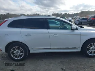 2015 Volvo XC60 T5 Drive-E Premier z VIN YV440MDB5F2610281, wystawiony jako IAAI lot #41479979 z przebiegiem 124 841 mil mil oraz . Historia ofert i sprzedaży dostępna na DreamBid. Obrazek 13.