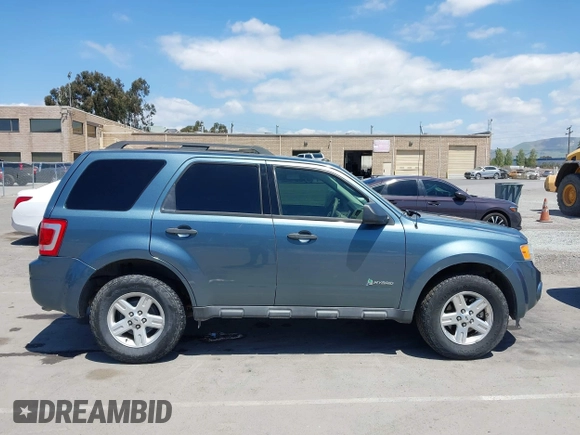 2011 Ford Escape Hybrid with VIN 1FMCU4K30BKC54584, listed as a IAAI auction lot 42131257 with 107,905 mi miles and . Bid and sale history available at DreamBid. Image 13.