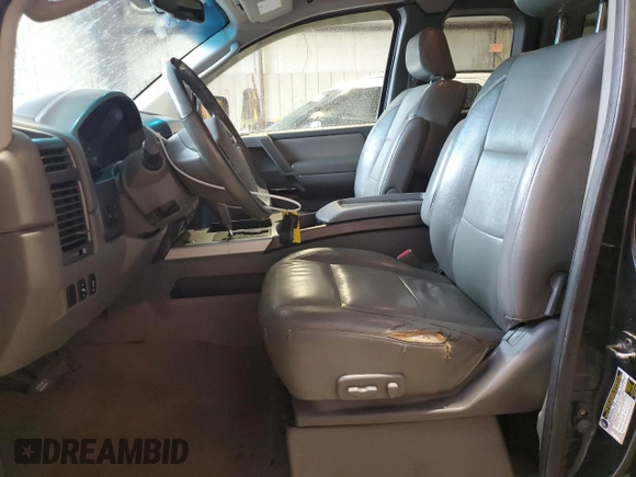 2007 Nissan Titan LE with VIN 1N6BA06A07N213482, listed as a Copart auction lot 51676285 with 184,796 mi miles and Salvage Title. Bid and sale history available at DreamBid. Image 7.