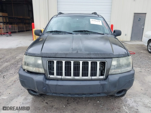 2004 Jeep Grand Cherokee Laredo with VIN 1J4GX48N74C412982, listed as a IAAI auction lot 41496258 with 195,671 mi miles. Bid and sale history available at carsss.com. Image 6.