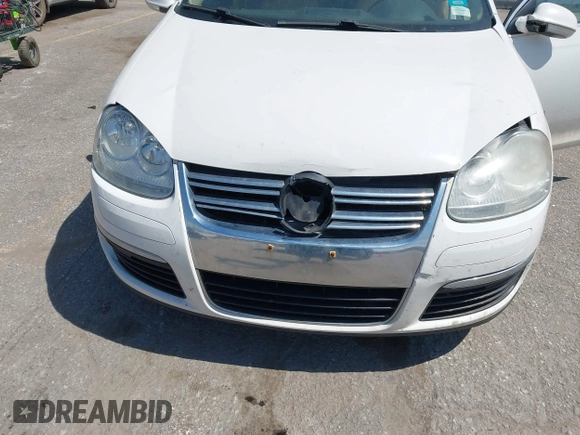 2009 Volkswagen Jetta SE z VIN 3VWRM71K99M057390, wystawiony jako IAAI lot #42094648 z przebiegiem 168 533 mil mil oraz . Historia ofert i sprzedaży dostępna na DreamBid. Obrazek 6.