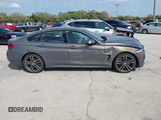2018 BMW 4 Series 440i with VIN WBA4J5C54JBF07315, listed as a IAAI auction lot 41738540 with 74,577 mi miles and . Bid and sale history available at DreamBid. Image 13.
