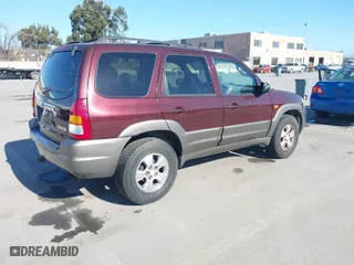 2001 Mazda Tribute LX with VIN 4F2YU08131KM39817, listed as a IAAI auction lot 41678877 with 210,715 mi miles. Bid and sale history available at carsss.com. Image 4.