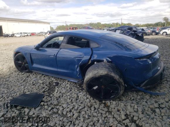 2023 Porsche Taycan with VIN WP0AA2Y1XPSA14080, listed as a Copart auction lot 72990774 with 18,311 mi miles and Salvage Title. Bid and sale history available at DreamBid. Image 2.
