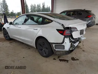 2023 Tesla Model 3 z VIN 5YJ3E1EA8PF412166, wystawiony jako IAAI lot #41461983 z przebiegiem 25 908 mil mil oraz . Historia ofert i sprzedaży dostępna na DreamBid. Obrazek 3.