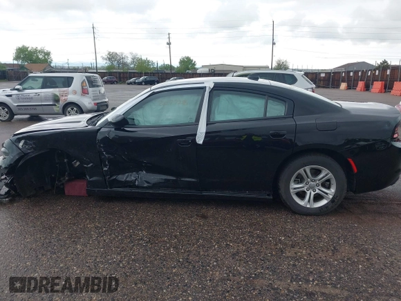2023 Dodge Charger SXT z VIN 2C3CDXBGXPH515585, wystawiony jako IAAI lot #42207728 z przebiegiem 51 686 mil mil oraz . Historia ofert i sprzedaży dostępna na DreamBid. Obrazek 13.