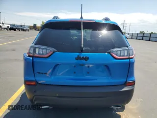 2020 Jeep Cherokee Altitude z VIN 1C4PJMLX3LD538832, wystawiony jako Copart lot #60269435 z przebiegiem 31 479 mil mil oraz Szkoda całkowita • Salvage title. Historia ofert i sprzedaży dostępna na DreamBid. Obrazek 6.