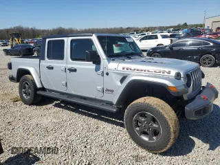 2023 Jeep Gladiator Rubicon with VIN 1C6JJTBG6PL579895, listed as a Copart auction lot 49588395 with 22,066 mi miles and Salvage title. Bid and sale history available at DreamBid. Image 4.