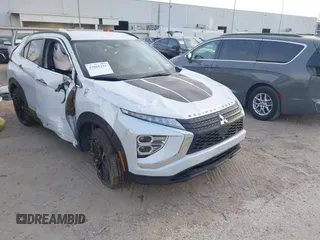 2024 Mitsubishi Eclipse Cross LE z VIN JA4ATVAA2RZ060509, wystawiony jako IAAI lot #42060191 z przebiegiem 13 421 mil mil oraz . Historia ofert i sprzedaży dostępna na DreamBid. Obrazek 1.